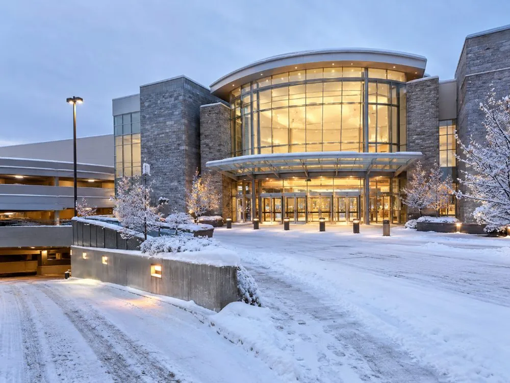 A Mall of America entrance under snow on a winter morning